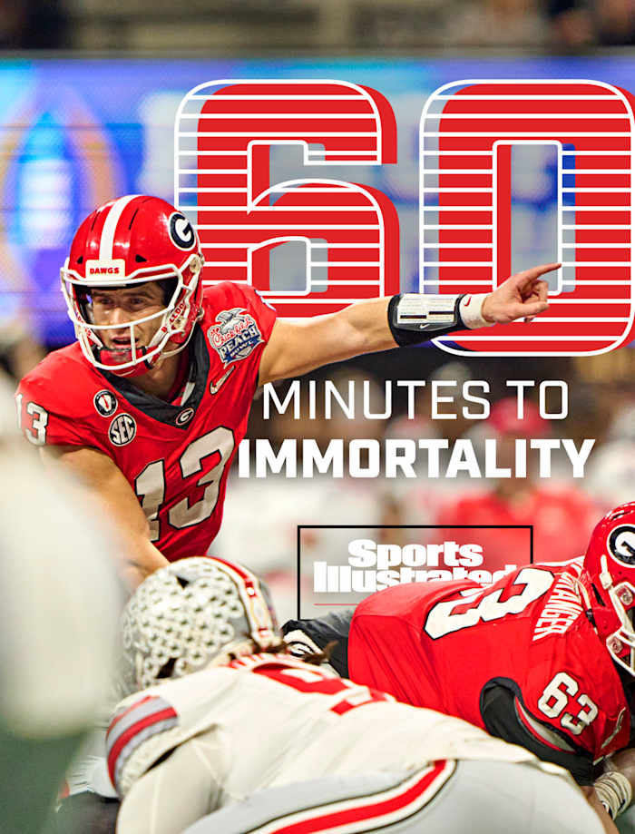 Stetson Bennett points before calling off a play at the line of scrimmage.